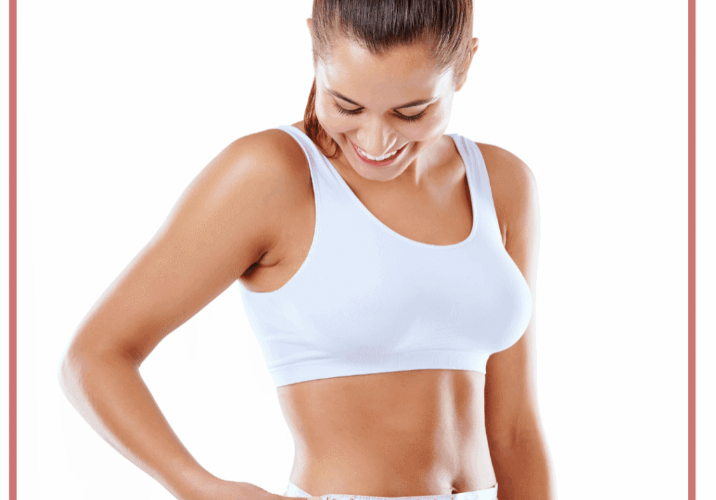 Woman in sportswear measuring her waist with a tape measure.